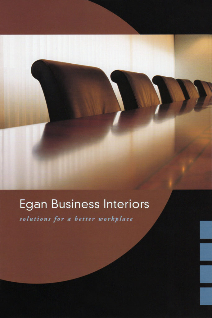 brochure cover showing a board room and leather chairs